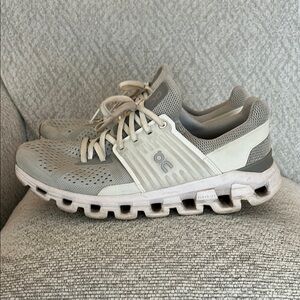 On Running Light Gray and White Sneakers